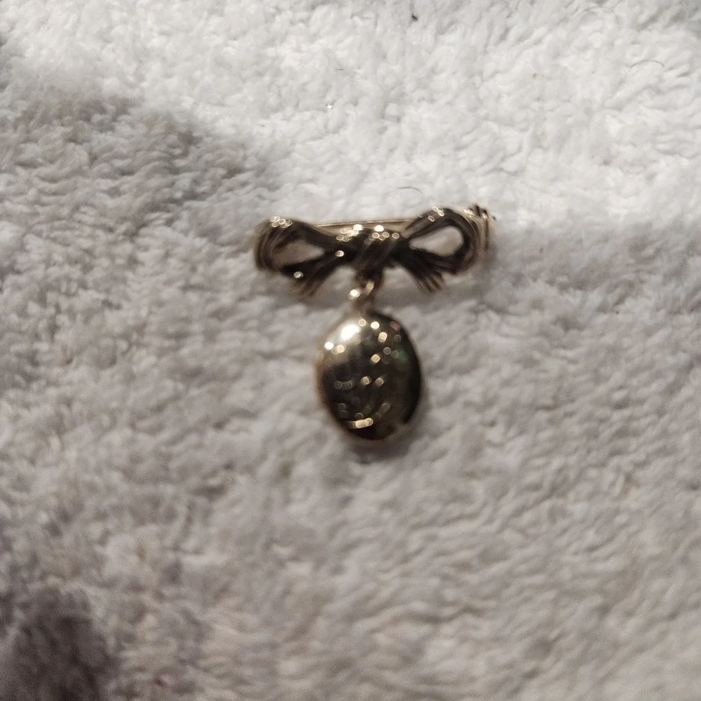 Vintage Gold Tone Bow Brooch with Engraved Floral Oval Dangle Locket Pin